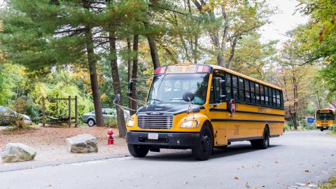 a school bus parked in the museum driveway