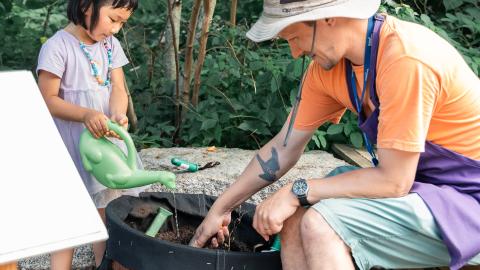 educator in DW garden