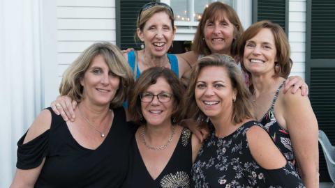 a group photo of 6 friends who are grandmothers