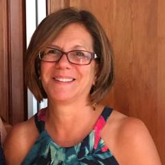 a headshot photo of Cheryl Beaudoin