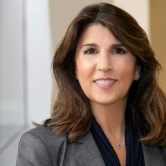 a headshot photo of Lisa Giglio