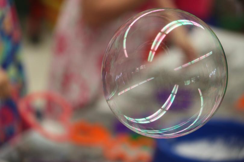 a close-up image of a bubble floating in the air