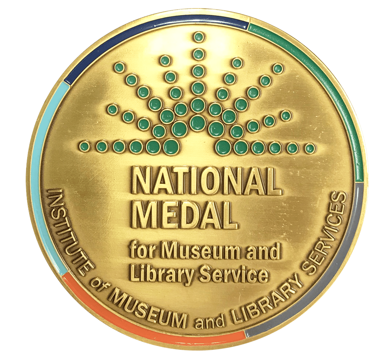 a round gold medallion that says, "National Medal for Museum and Library Service"