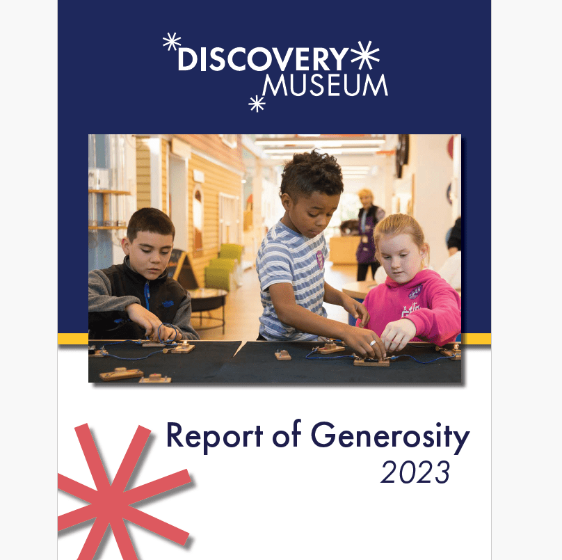 picture of a report cover with a photo of 3 children using a tabletop exhibit in a museum