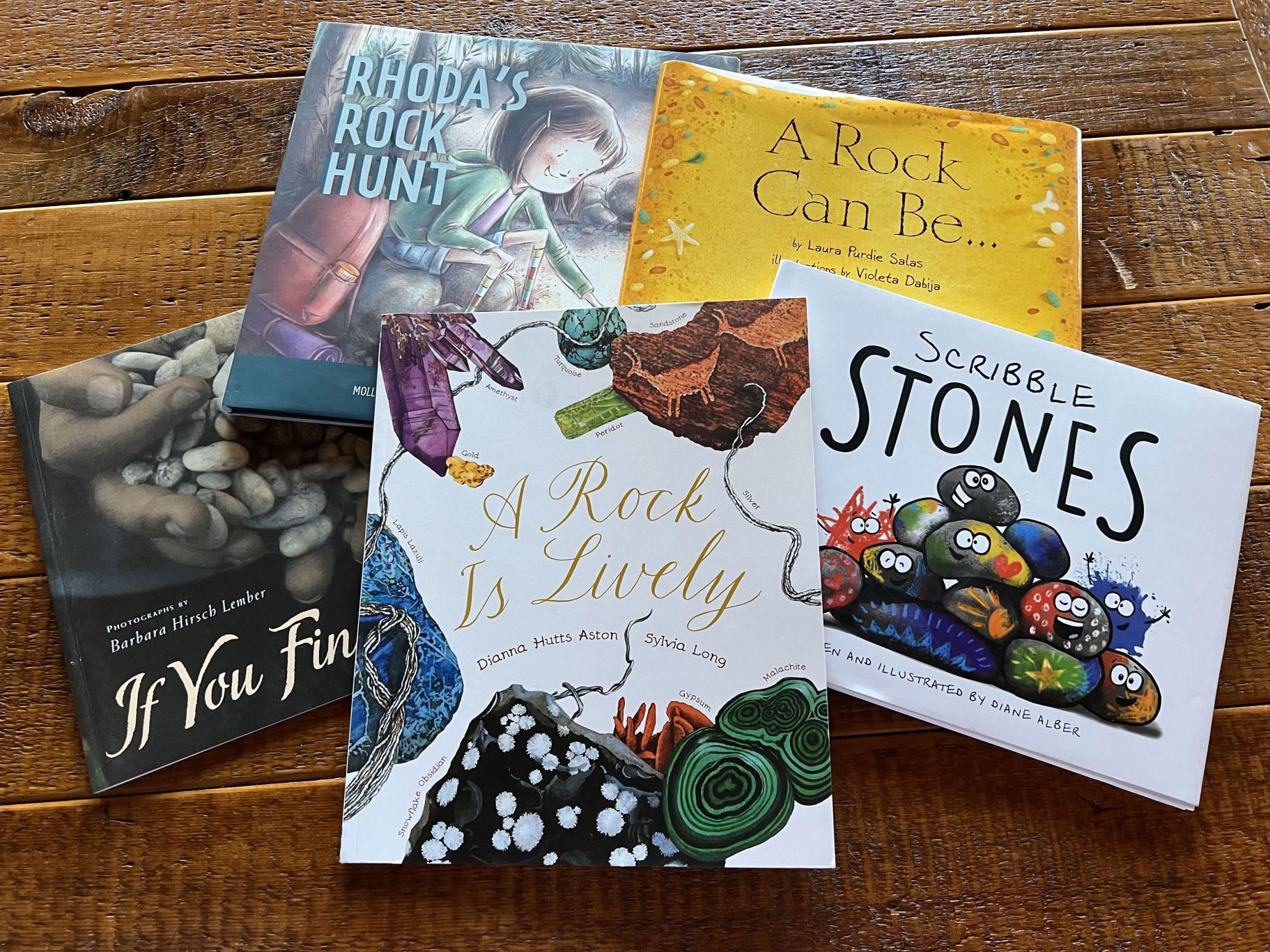 a photo of several books about rocks laying on a table